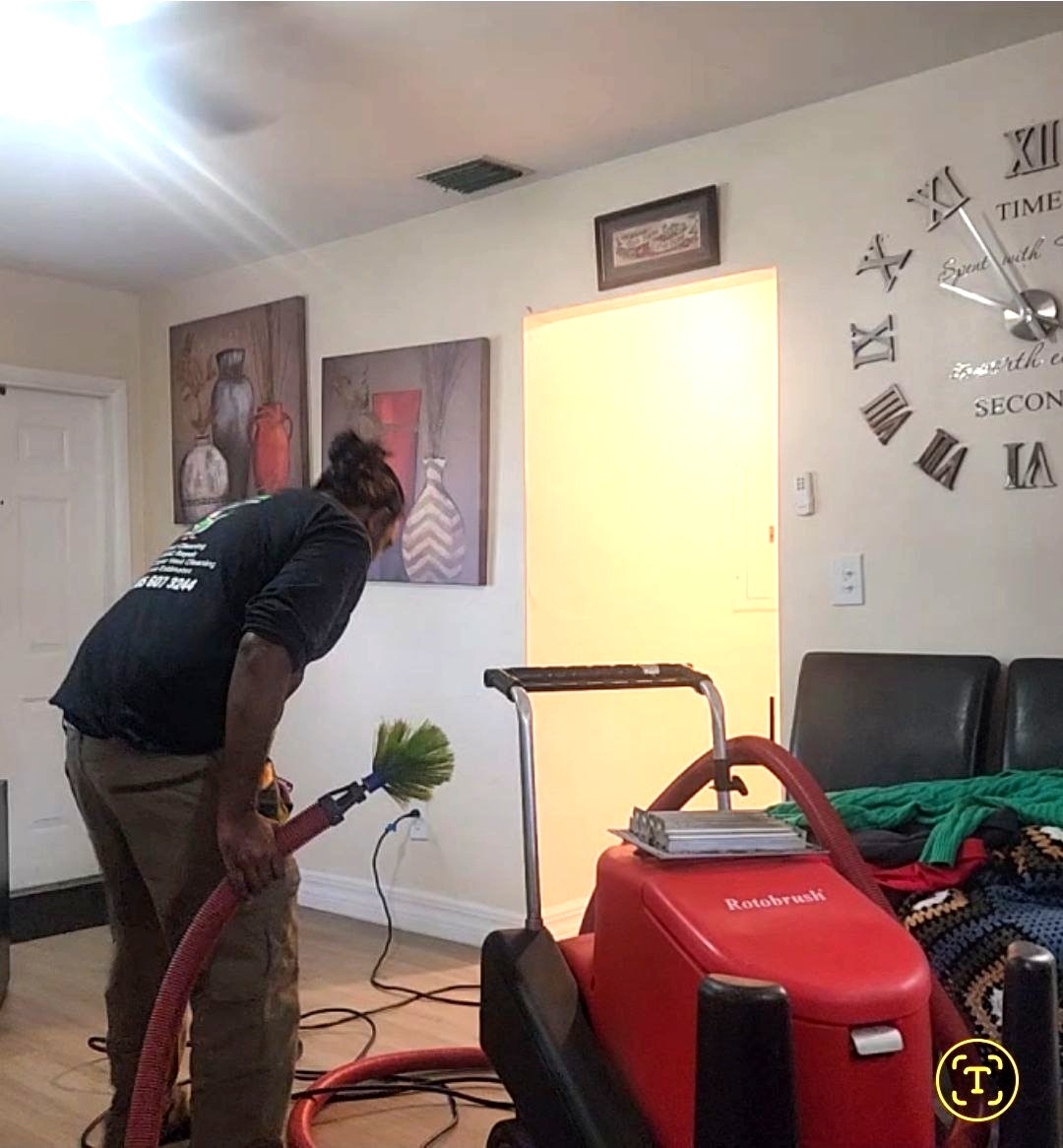Air Duct Cleaning Miami technician with professional Rotobrush duct cleaning machine
